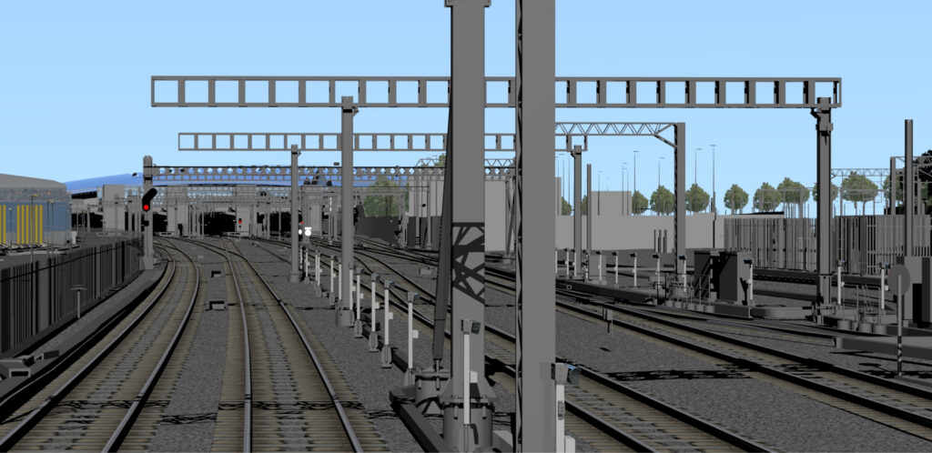 A detailed digital twin of a complex rail yard, showing multiple tracks, signals, and overhead gantries for a transit project.