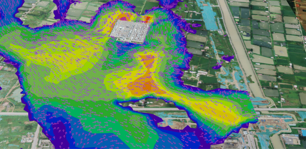 A colorful flood simulation model showing water flow patterns and depth around an industrial facility, used for water resource management.