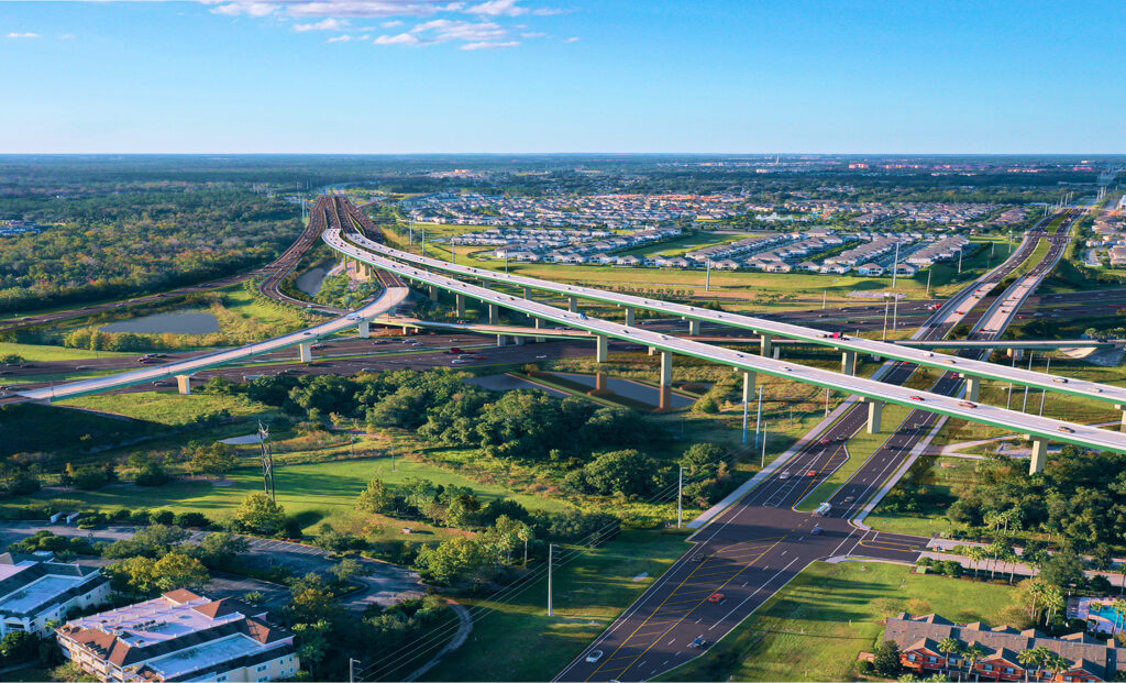 An aerial rendering of a large, multi-level highway interchange surrounded by residential areas and green space, a finalist project by RS&H.