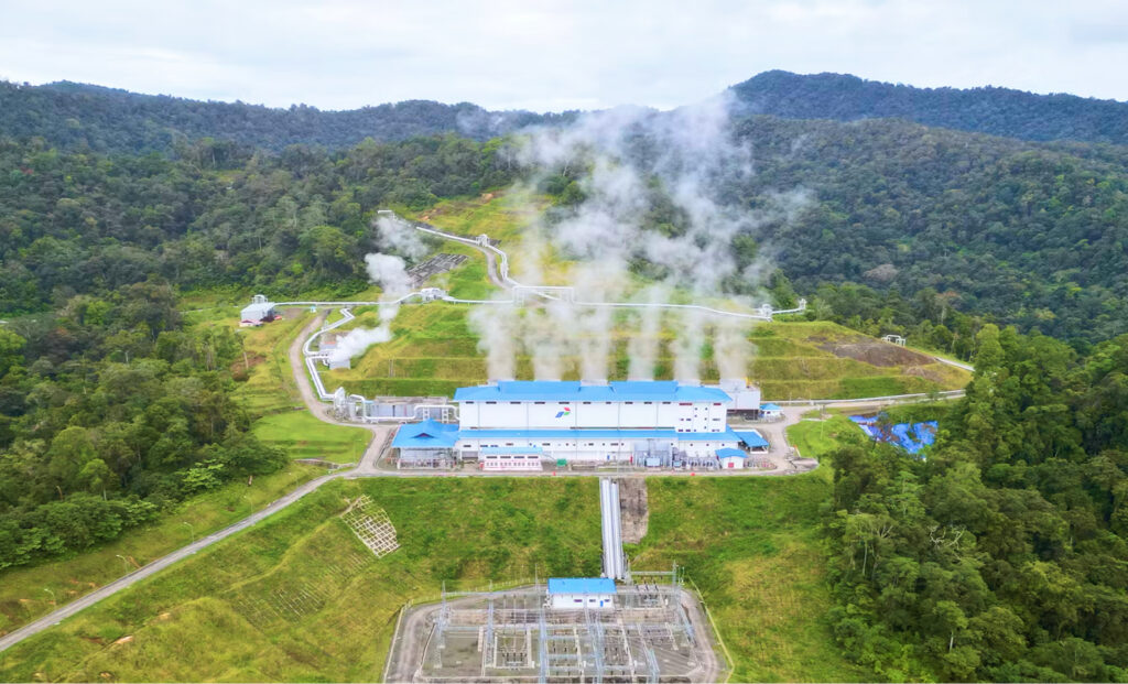 An aerial view of the Rantau Dedap Geothermal Power Plant nestled in a lush, green valley, a finalist project by PT Wijaya Karya (Persero) Tbk.