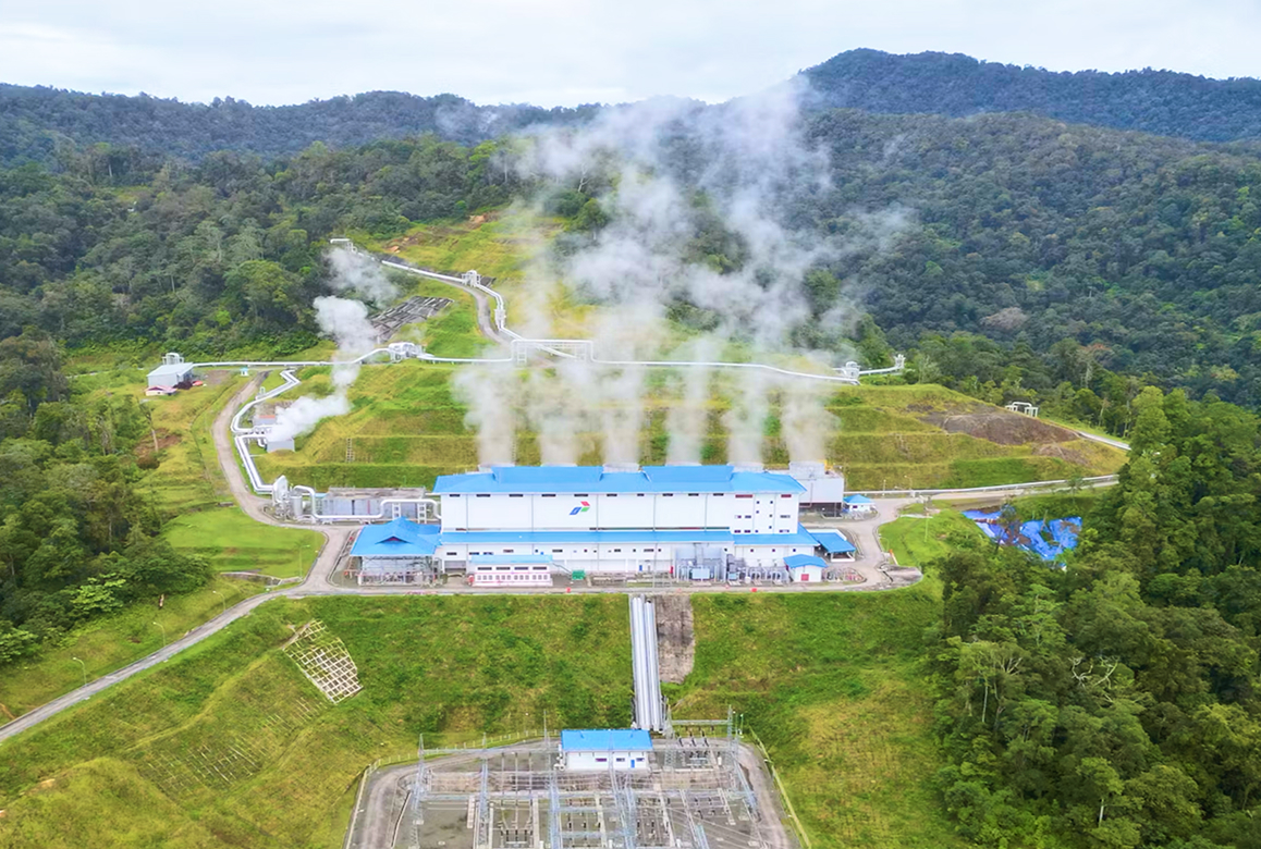 An aerial view of the Rantau Dedap Geothermal Power Plant nestled in a lush, green valley, a finalist project by PT Wijaya Karya (Persero) Tbk.