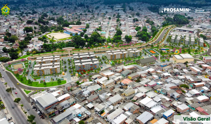 Aerial view of a residential urban area in Manaus, highlighting both densely packed older buildings and new apartment complexes with green spaces developed under the Social Program Manaus.