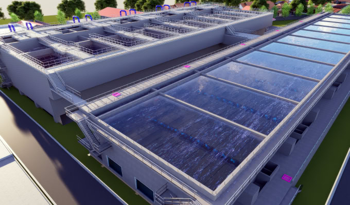 A large water treatment facility with multiple rectangular settling tanks, walkways with railings, and visible water flow in some sections, WIKA Tirta Jaya Jatiluhur drives water transformation for a better tomorrow.